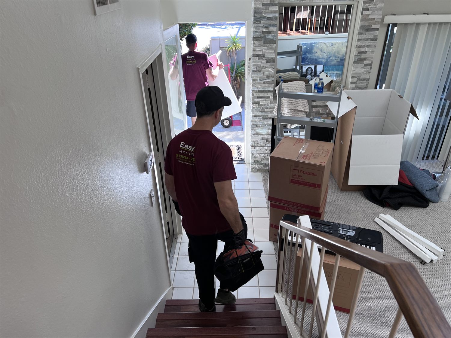 Easy Moving LA crew organizing boxes and furniture for transport